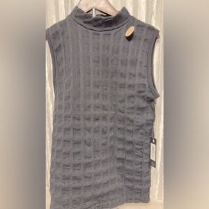 Dictionary sleeveless fleece lined top. Women’s size S/M​